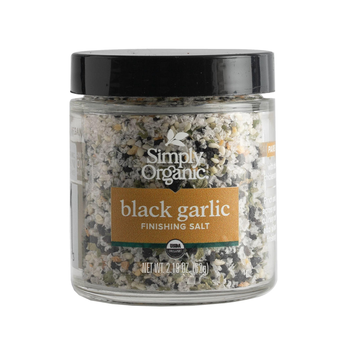 Simply Organic Black Garlic Finishing Salts jar close-up enhancing grilled meat with savory depth