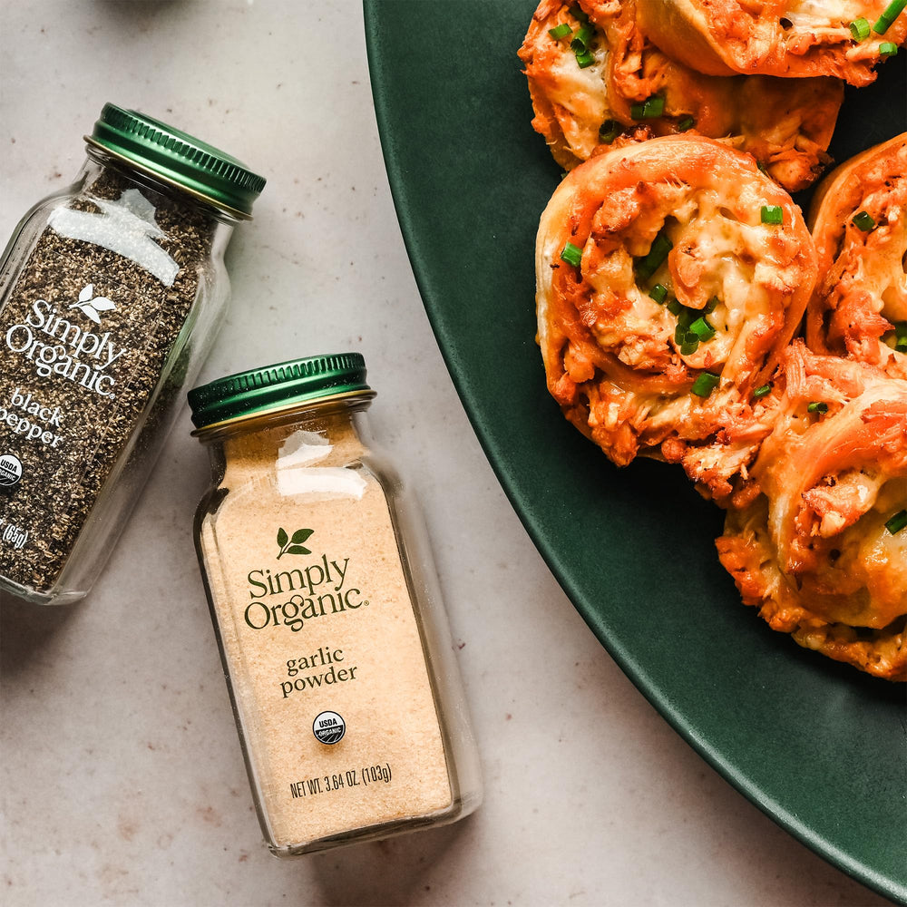 Simply Organic Garlic Powder bottle with label, transparent packaging shows quality.