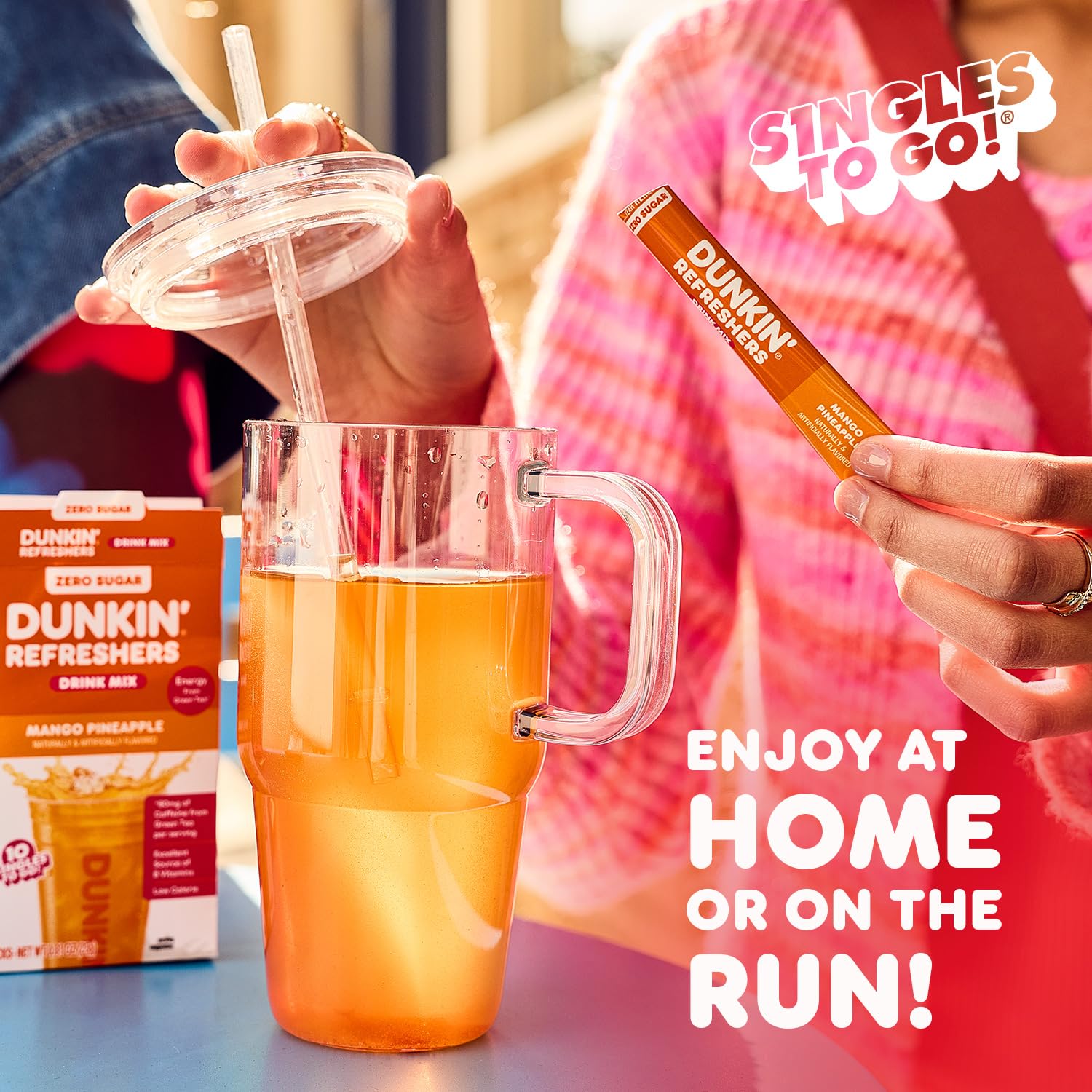 Dunkin Refreshers ready-to-mix powder in a bottle for quick refreshment.