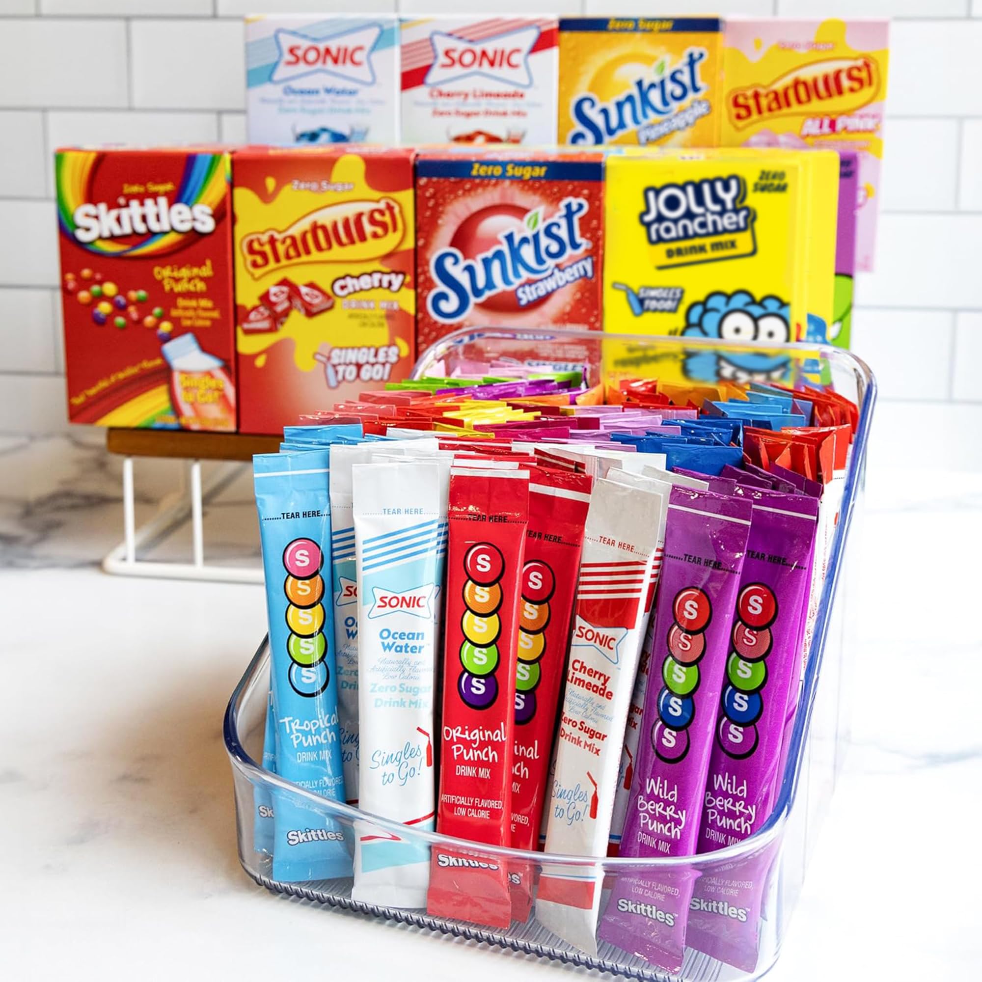 Singles To Go! licensed-brand flavors collection shows Sonic, Starburst, Skittles variety.