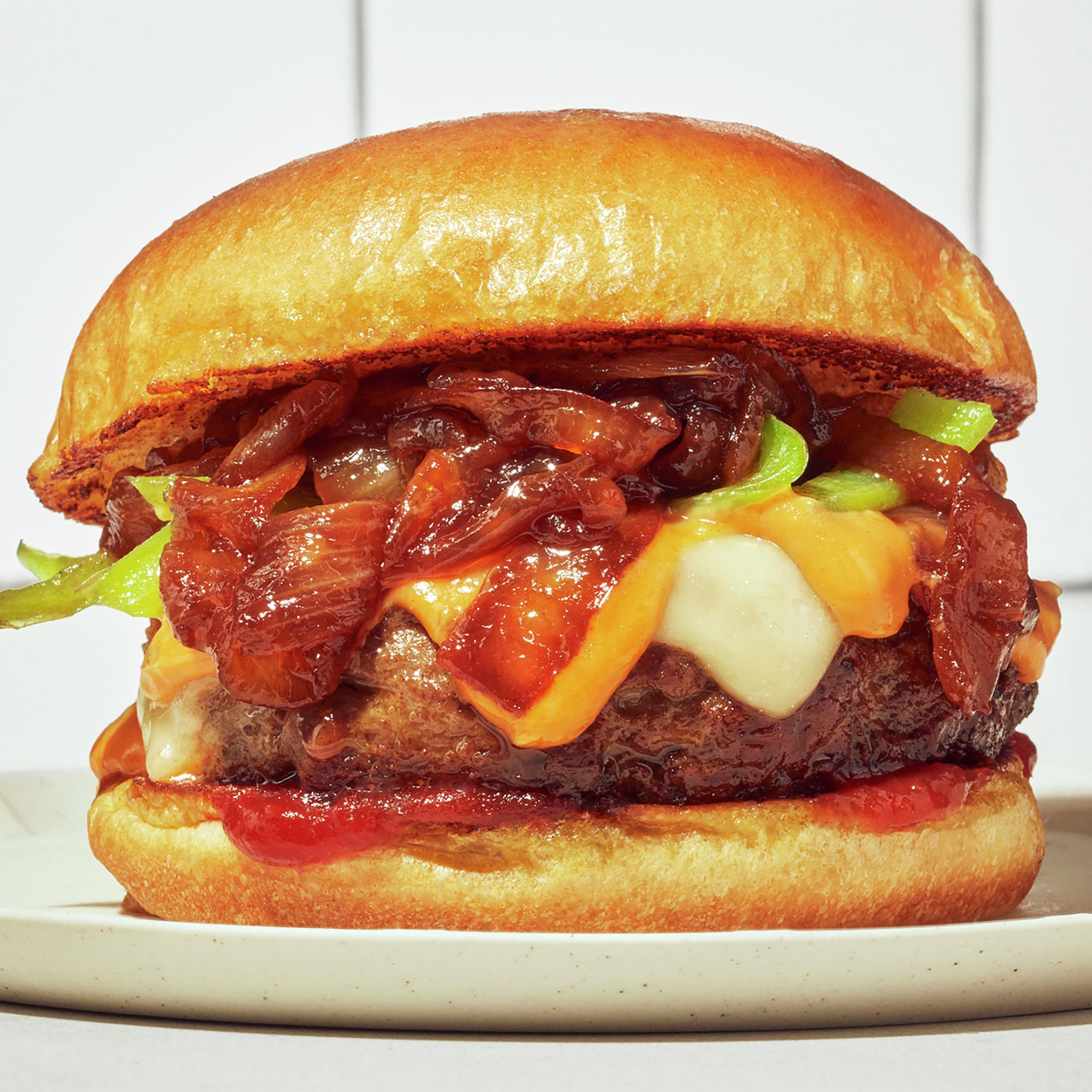 Close-up of chipotle peppers highlights smoky heat in Sir Kensington's mayo.