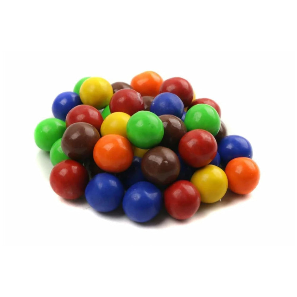 Close-up reveals crisp shell and smooth chocolate core, a signature Sixlets contrast.