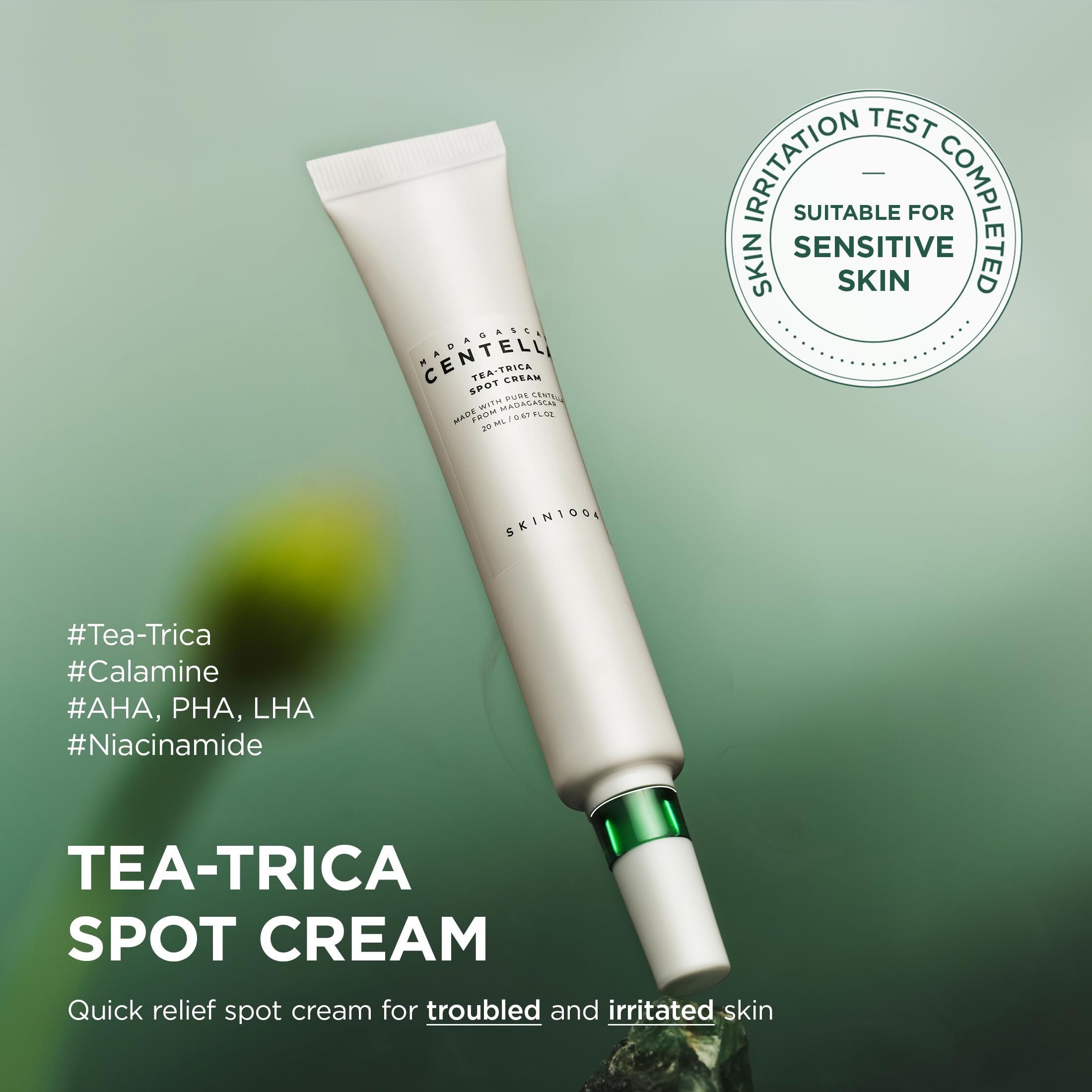 SKIN1004 Tea-Trica Spot Cream tube resting on a clean surface.