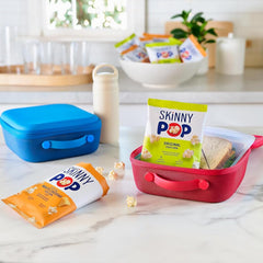 SkinnyPop Original popcorn close-up showing light, crunchy texture.
