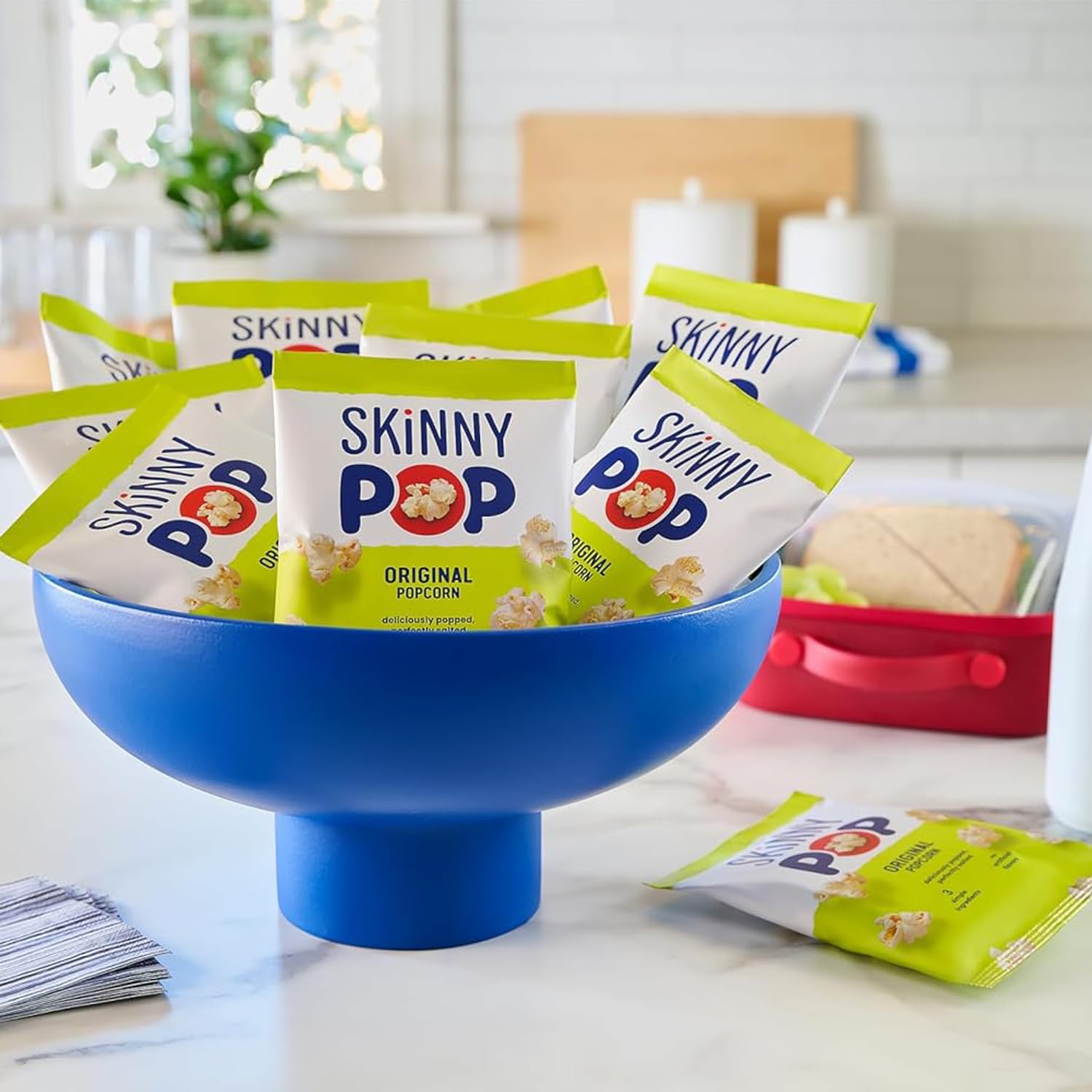 Dairy-free and peanut-free SkinnyPop Original suitable for gatherings