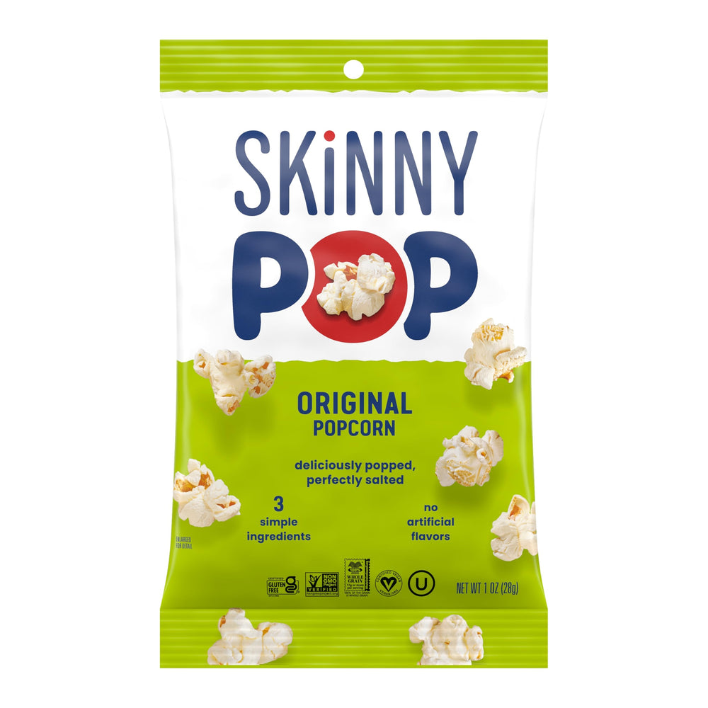 SkinnyPop whole grain popcorn action shot highlights wholesome ingredients and crunch.