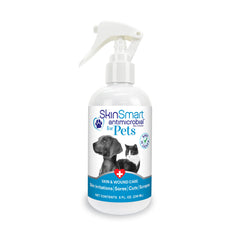 SkinSmart Antimicrobial wound care spray bottle on paw supports healing and infection prevention.