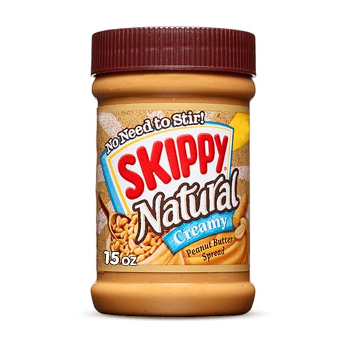 SKIPPY jar with cracked peanut pieces highlighting chunky texture.