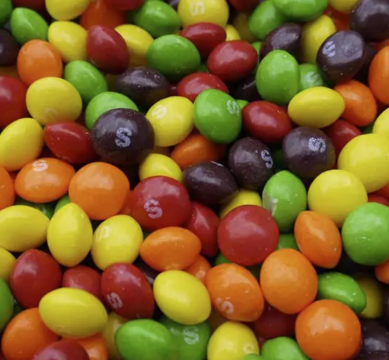 On-the-go Skittles packs fit in bags, cars, and desks.