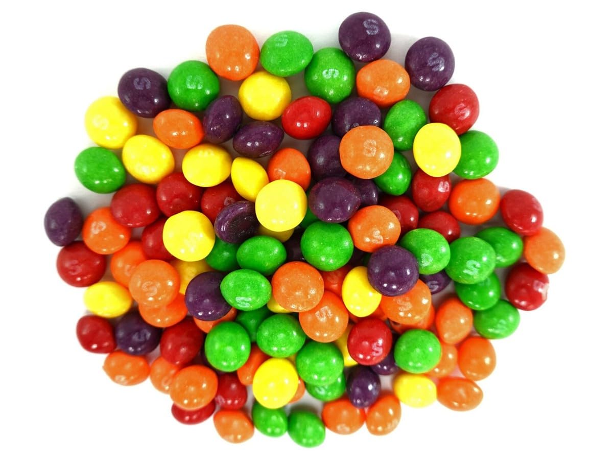 Colorful Skittles display for parties and mood-boosting snacking.
