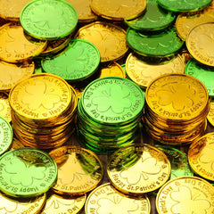 Skylety St. Patrick's Day coins used as stage props with a festive vibe.