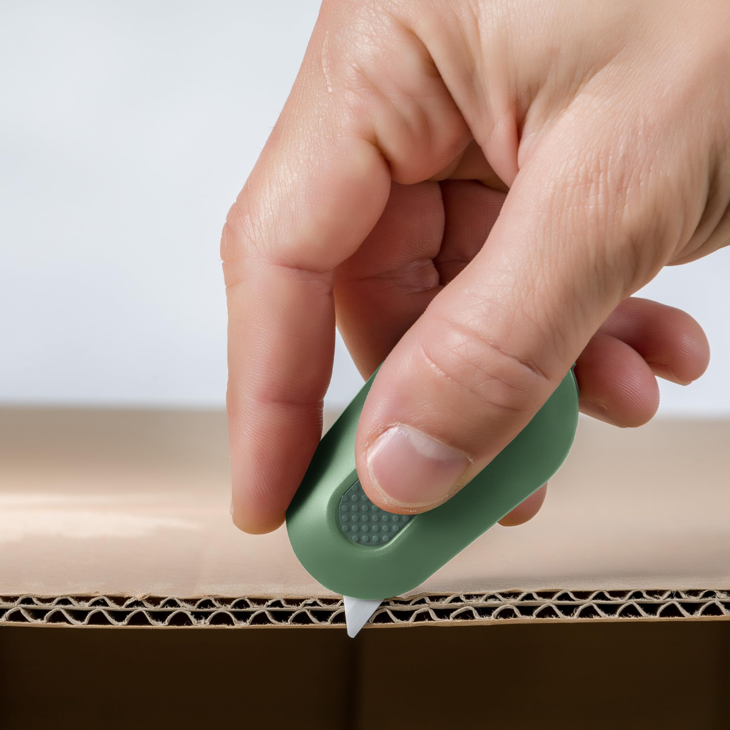 Slice Mini Box Cutter rust-free ceramic blade lasts longer.