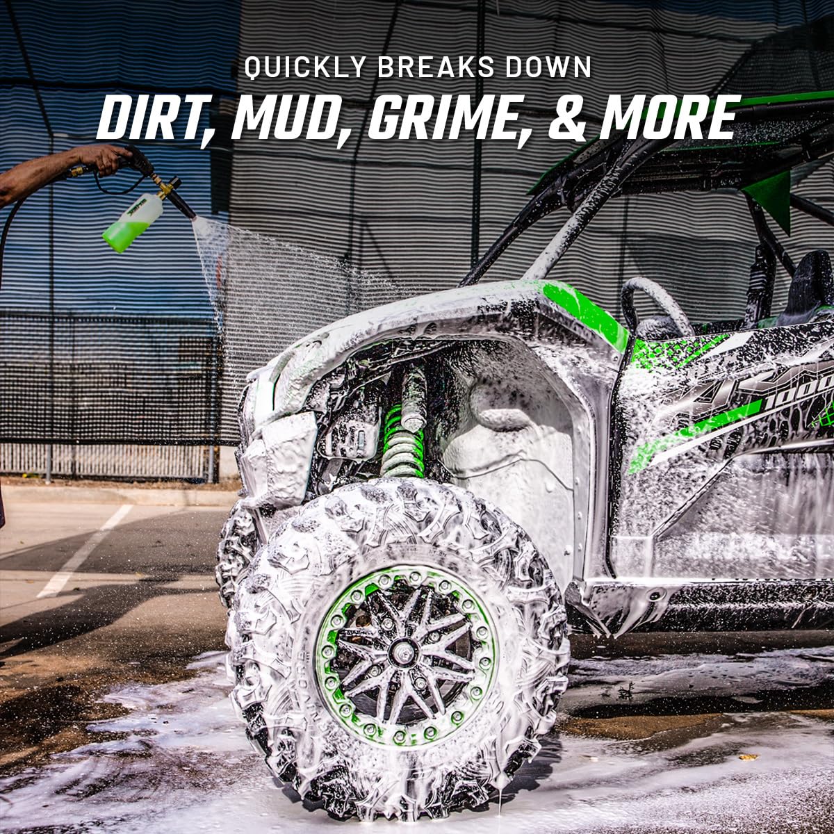 Dirt bike being cleaned with the wash’s premium formula lifting mud for a smooth finish