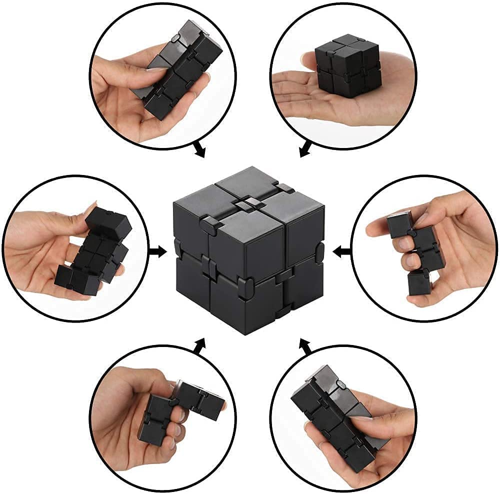 Small Fish Infinity Cube in hand demonstrates discreet, on-the-go stress-relief potential.