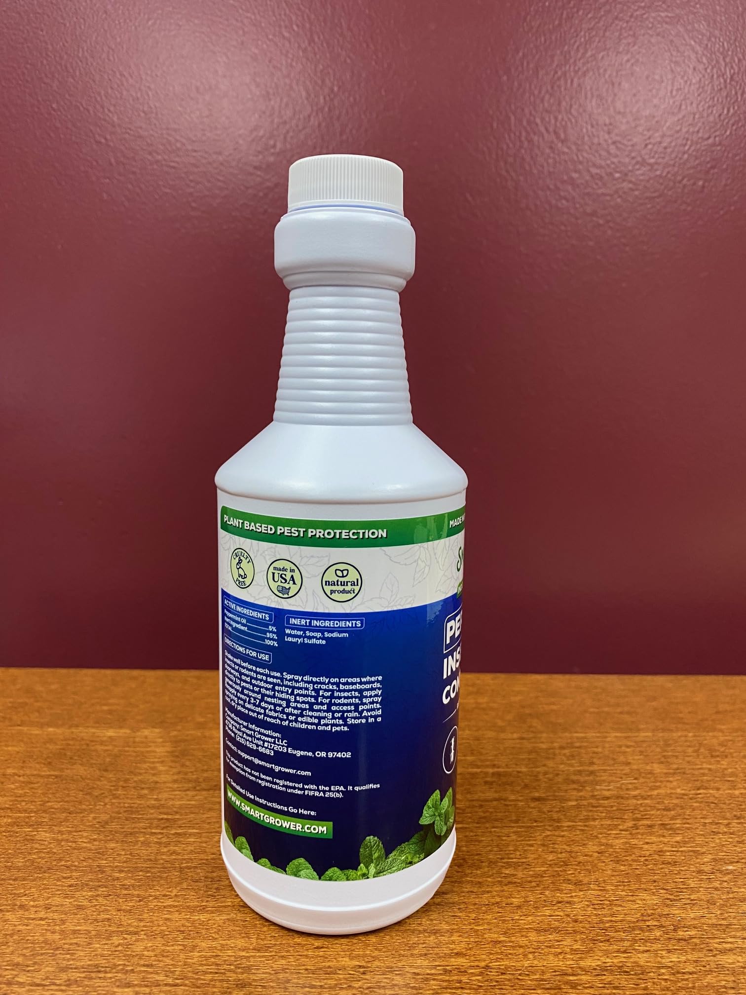 Smart Grower peppermint oil spray ready for indoor kitchen use.