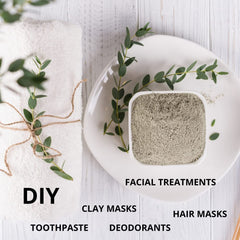 SMART SOLUTIONS Bentonite Clay hair mask spread on scalp for cleansing and nourishment.