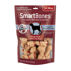 SmartBones Mini Bones with real chicken inside wrap, a tasty, digestible chew for dogs.