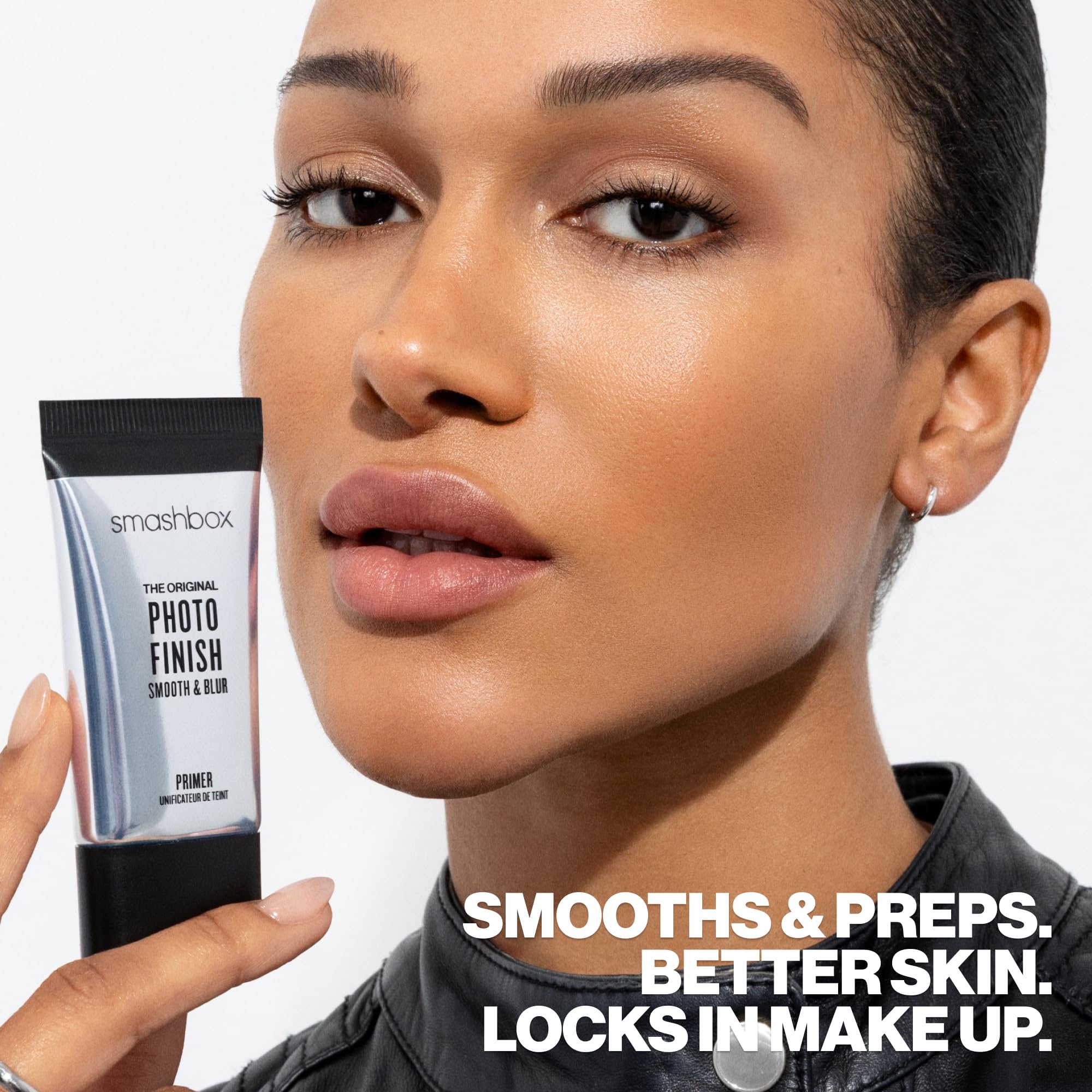 Smashbox primer as a makeup base for a polished look.