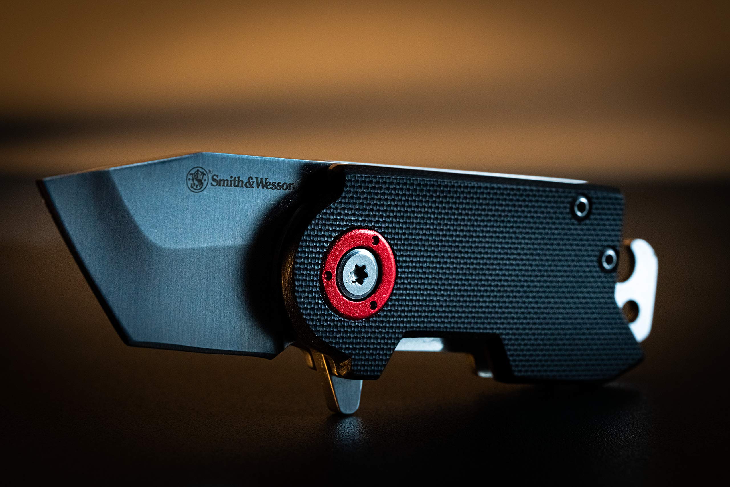 G-10 handle detail on Smith & Wesson Benji for a secure grip.