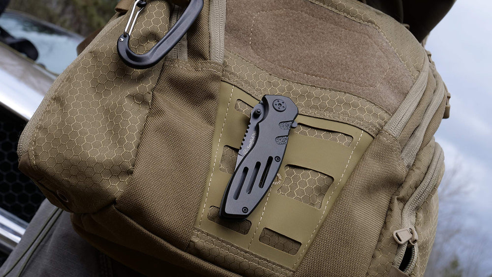 Smith & Wesson Extreme Ops shown in outdoor setting ideal for versatile field tasks.