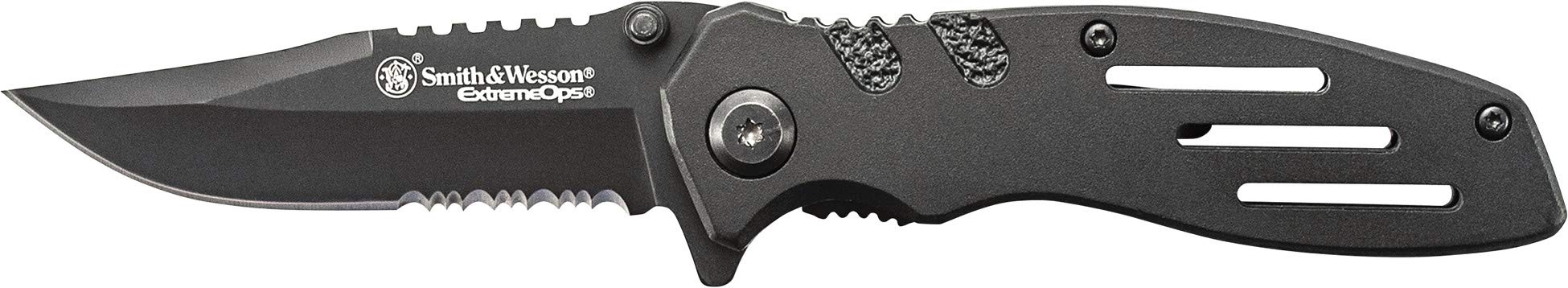 Smith & Wesson Extreme Ops blade close-up shows serrated clip point for tough tasks.