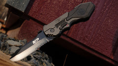 Smith & Wesson SWMP4LS serrated clip point blade with aluminum handle and secure liner lock for reliable EDC.