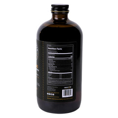 Smokeshow syrup being poured for a quick mixed drink.