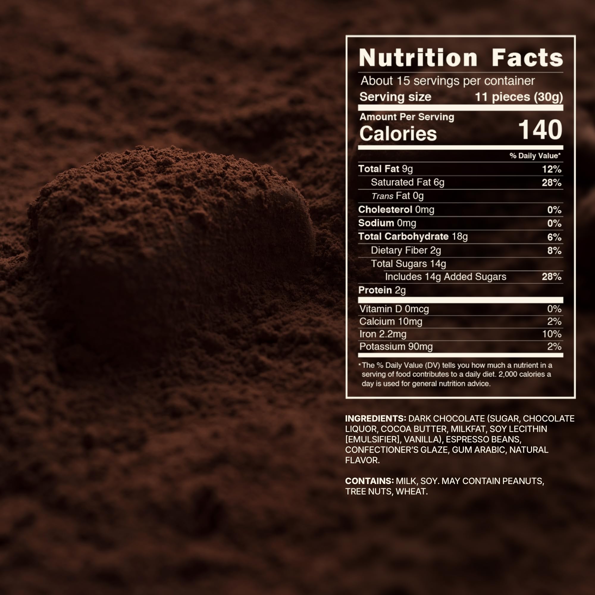 Closeup of glossy dark chocolate coated espresso beans with rich aroma.