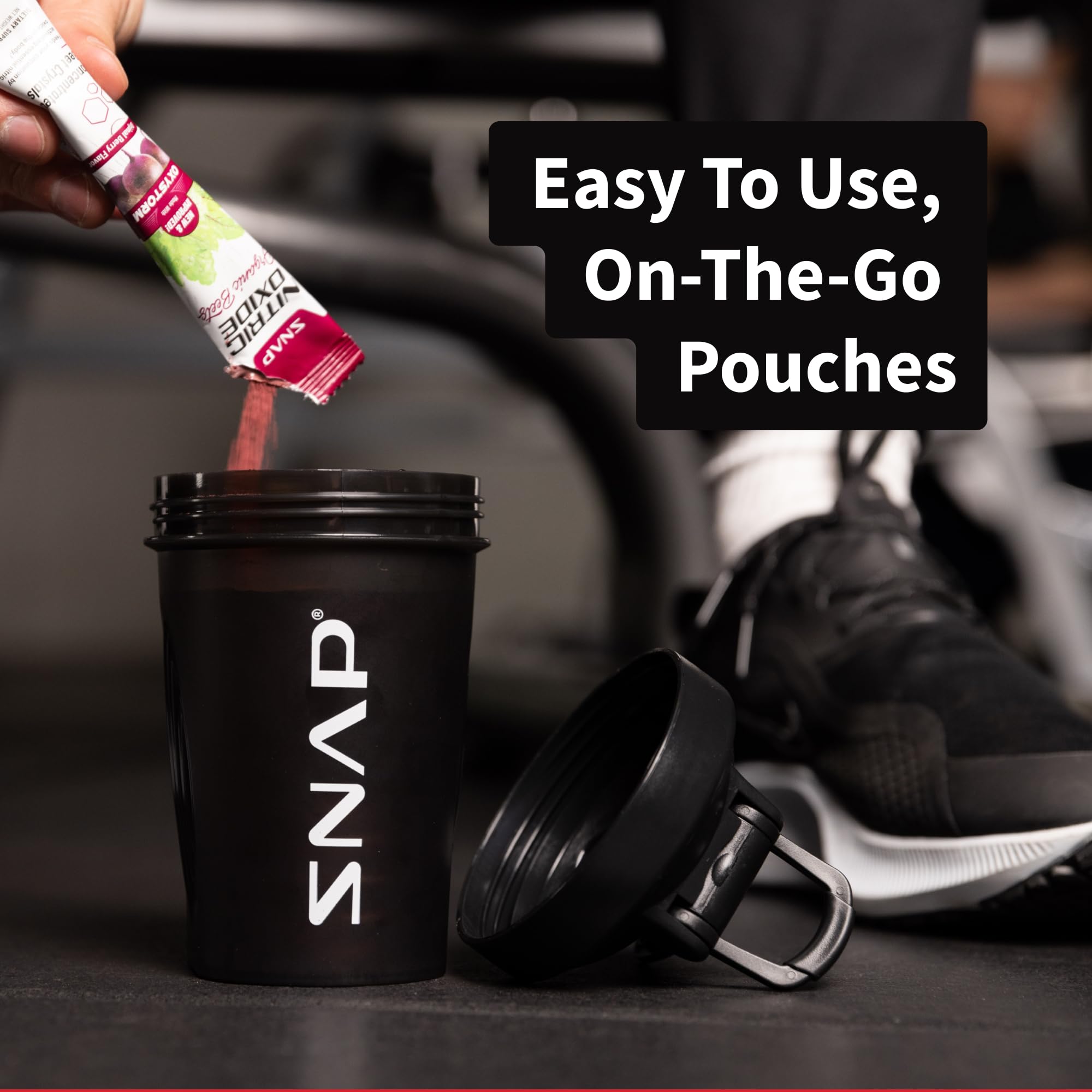 Snap Supplements user mixing powder in gym or office setting