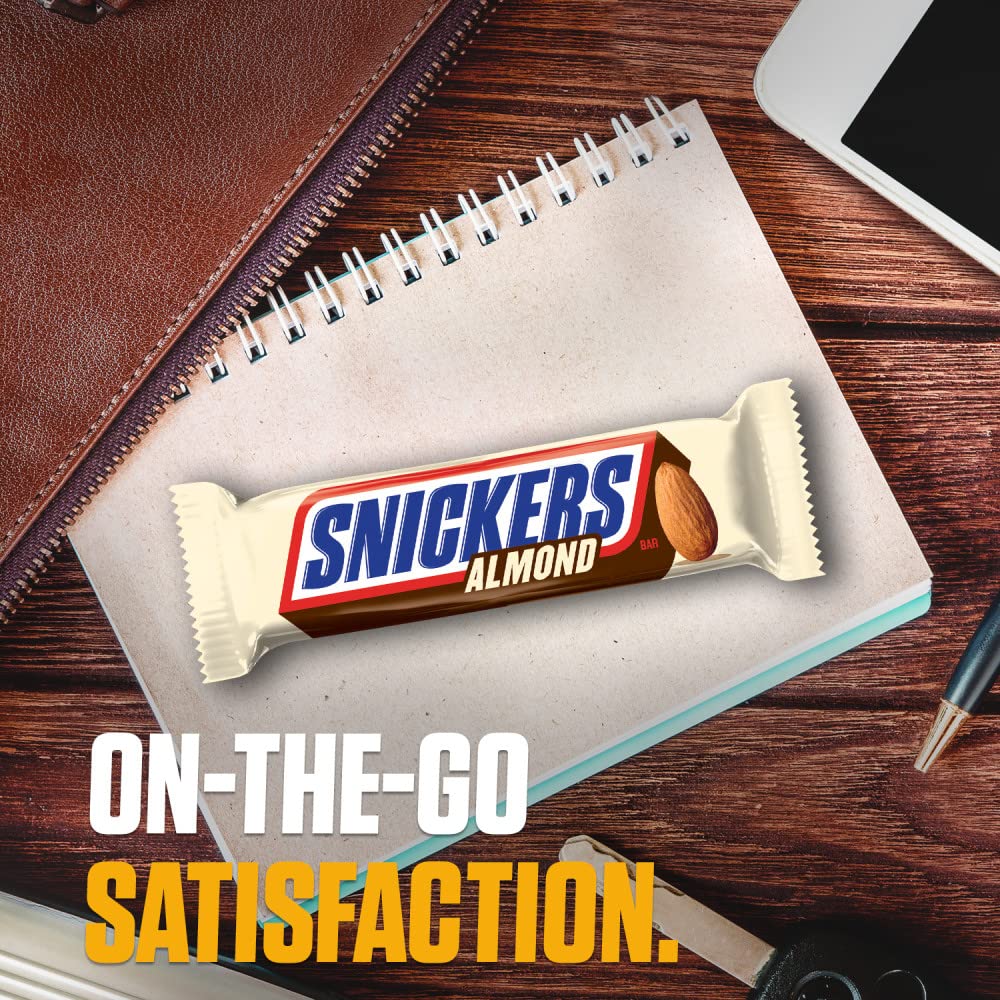 SNICKERS Almond Bars display in a gift-basket setup for celebrations.