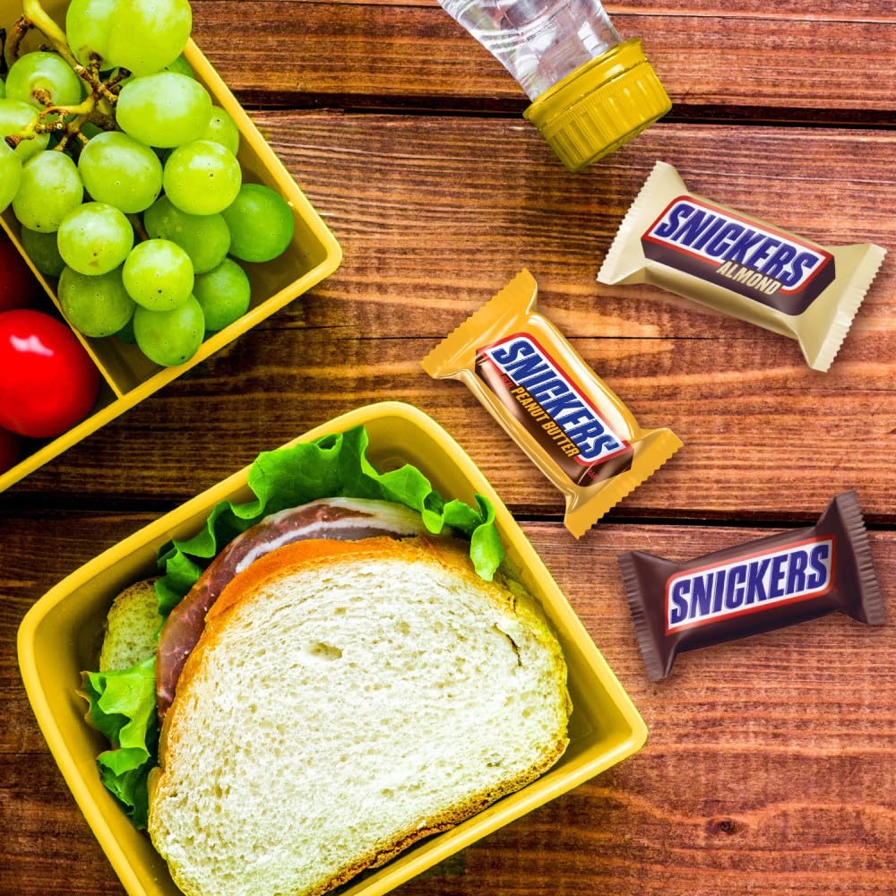 Snickers couch snack night offers convenient bite-sized satisfaction on movie nights.