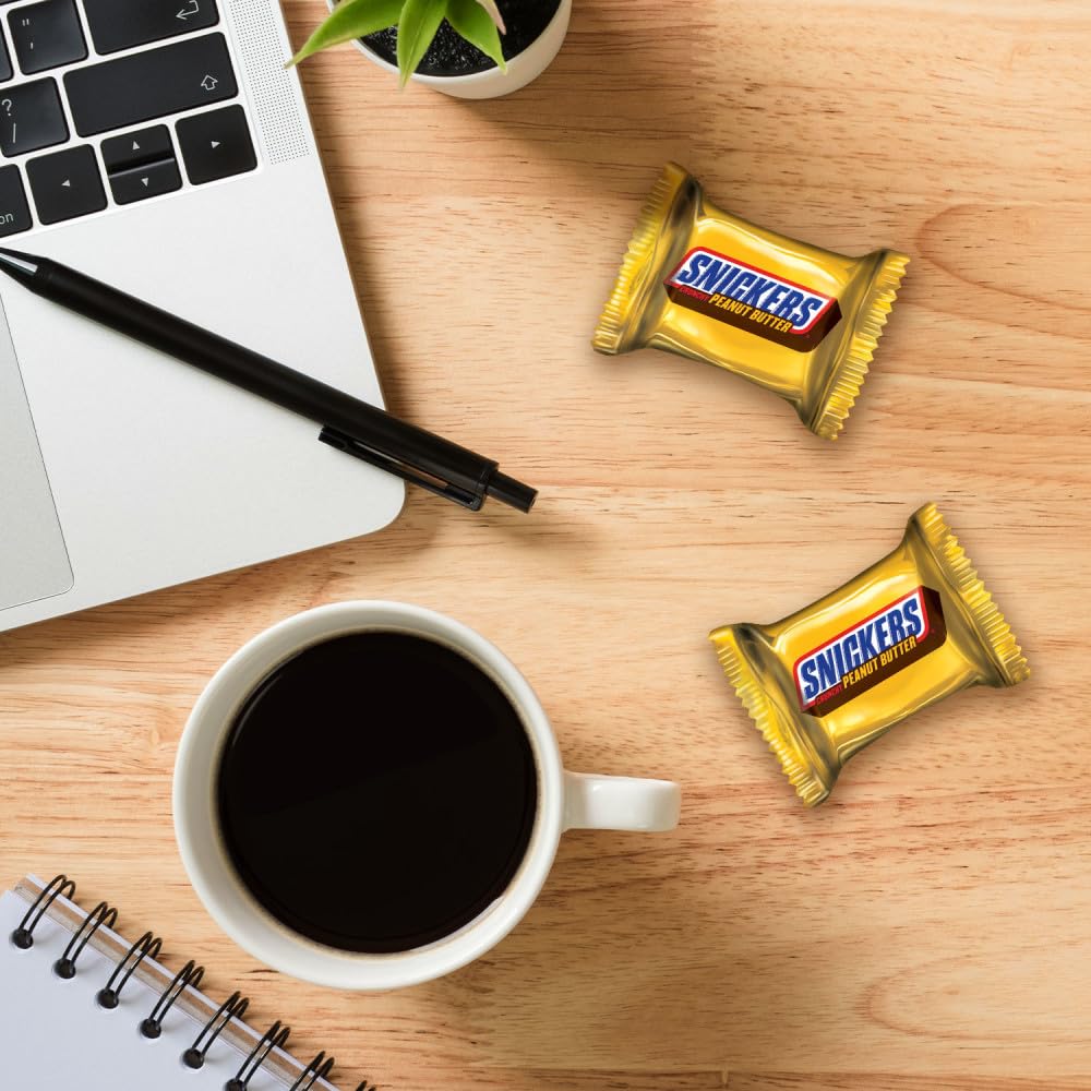 Snickers Fun Size bag open reveals bite-sized snacks.