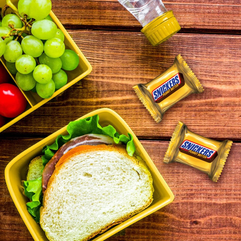 Snickers Fun Size bars in a bowl for movie night.