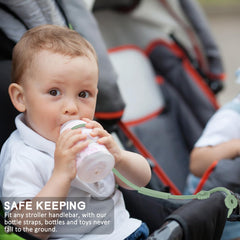 Socub teether bottle harness secures toys and teething items during travel.