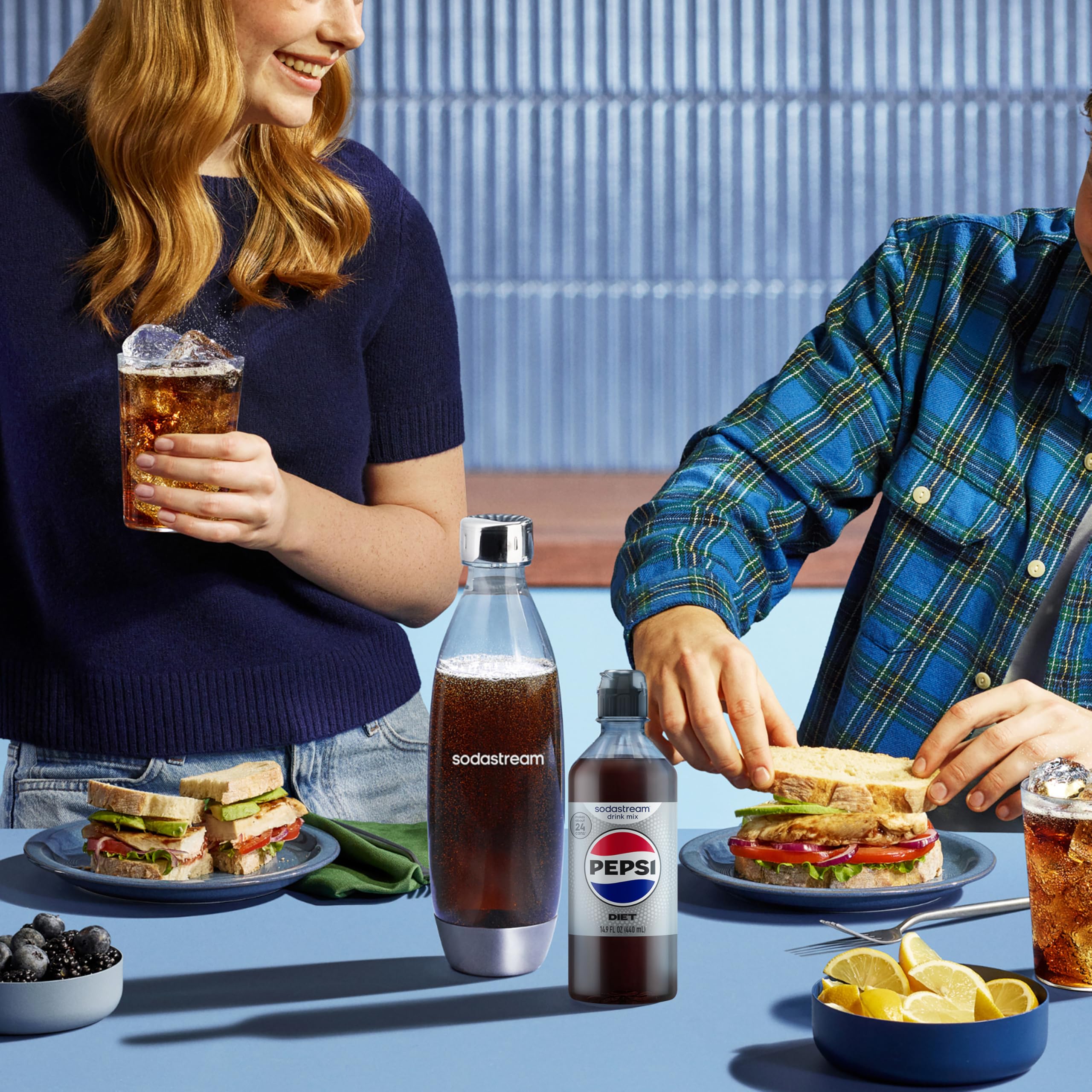 SodaStream Diet Pepsi bottle in hand, convenient flavor option.