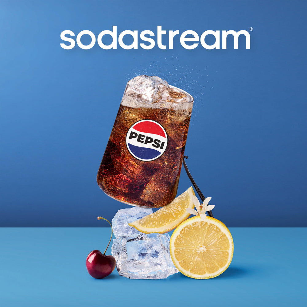 SodaStream Pepsi Zero Sugar bottle beside glass of fizzy drink ready to sip