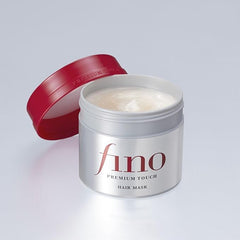 SOFIA BY ODE Fino Premium Touch Hair Mask hand applying for damaged hair repair