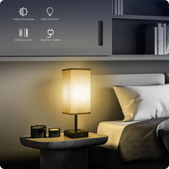 Soilsiu bedside lamp shade in gray fabric softens brightness for cozy evenings.