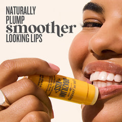 Sol de Janeiro Brazilian Kiss lip butter application demonstrates fast melt-in formula.