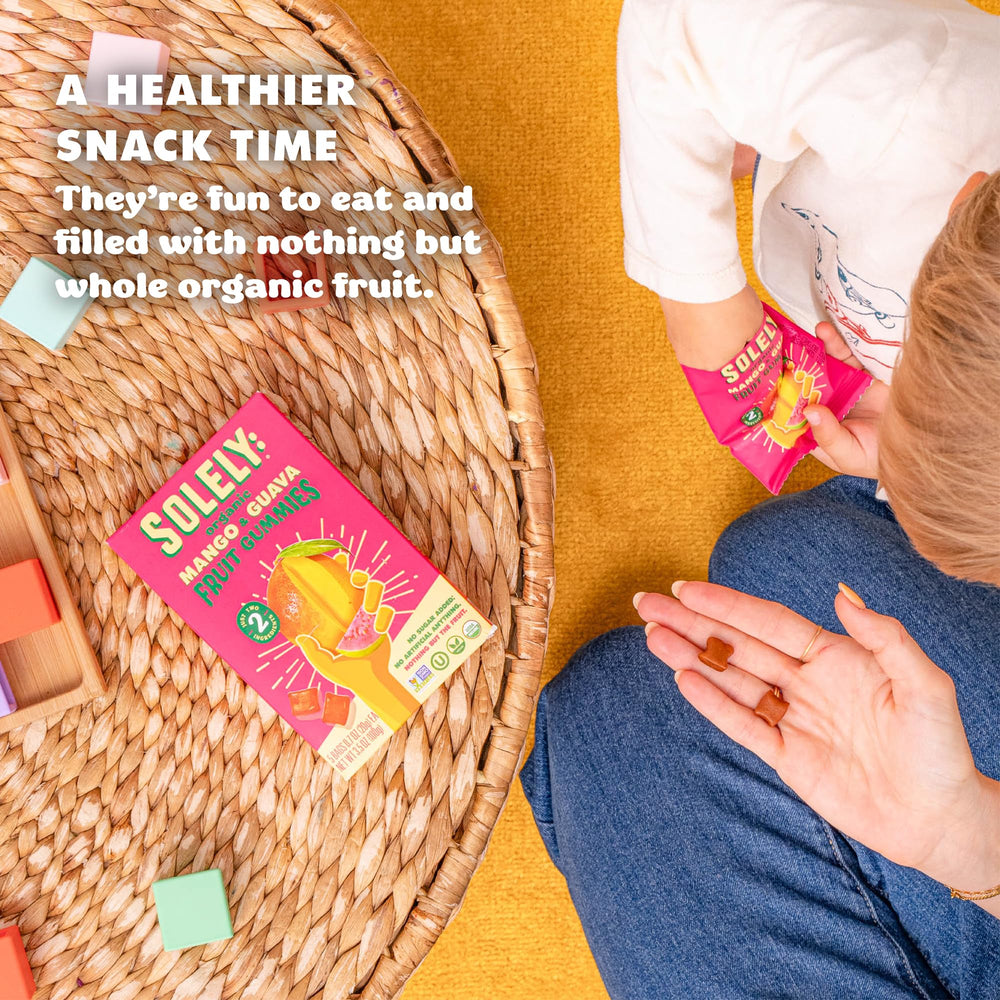 SOLELY Organic Mango Gummies box with five bags, ideal for lunchboxes.