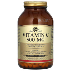 Solgar Vitamin C 500 mg veggie capsules line up on a white background