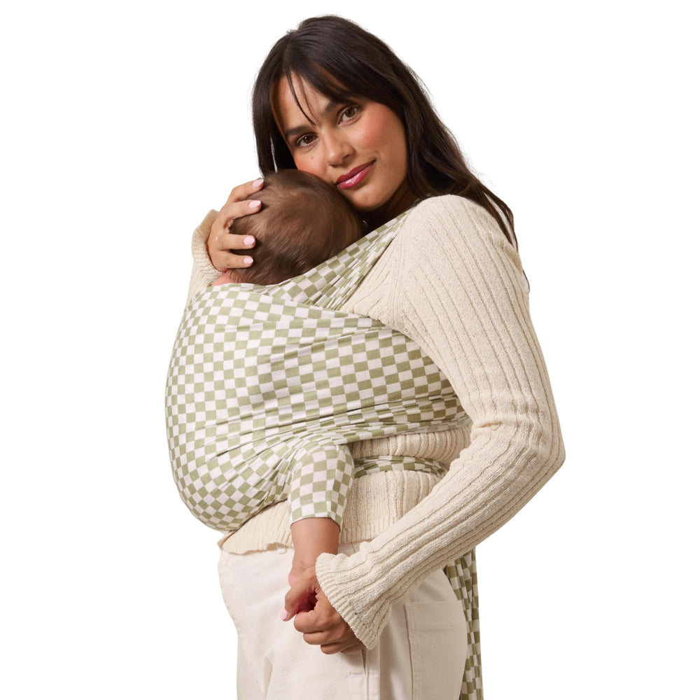 Solly Baby Wrap in sage chequer fabric offers buttery-soft, breathable newborn comfort.