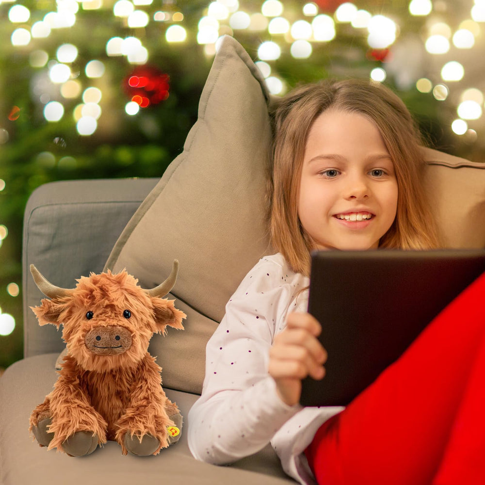 SOLPOBEI Highland cow plush shown in a gift-ready setup.