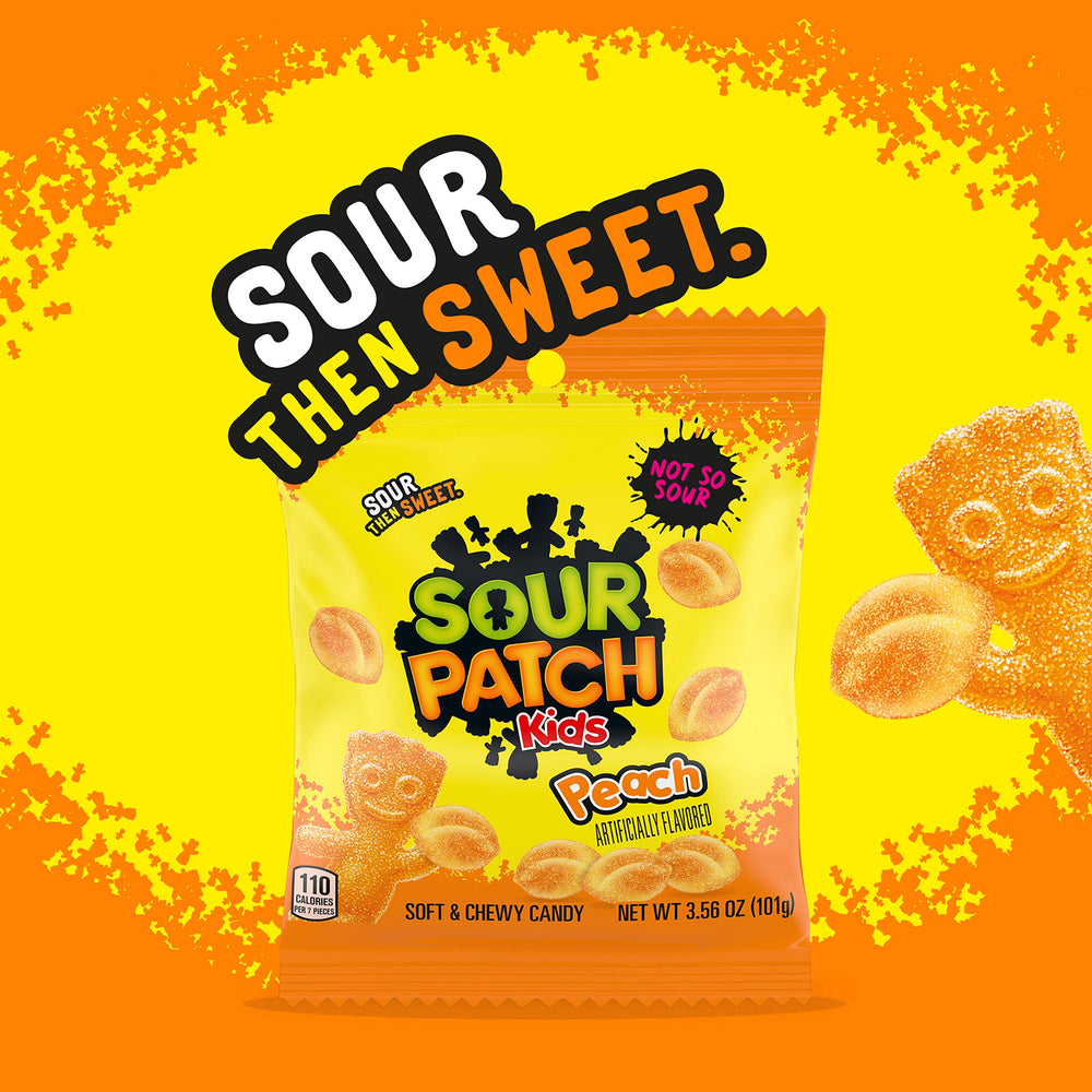 Close-up of peach-shaped gummies with tangy sour coating