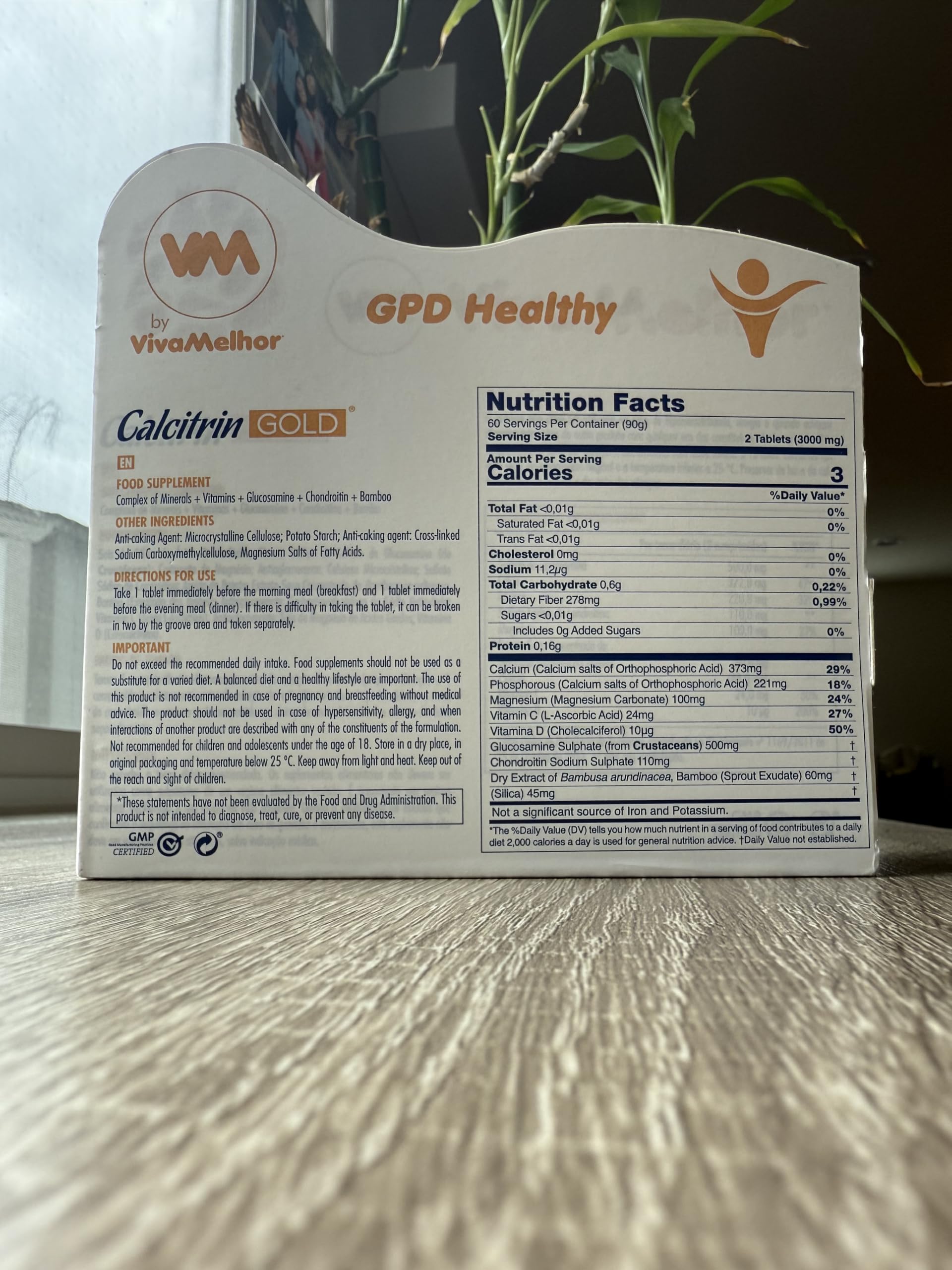 Soy Sano Calcitrin Gold tablets in hand showing easy daily intake.