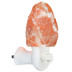 Spantik pink Himalayan salt lamp amber glow creates cozy ambience.