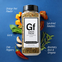 Spiceology Greek Freak seasoning scoop reveals vibrant herb blend for seasoning versatility.