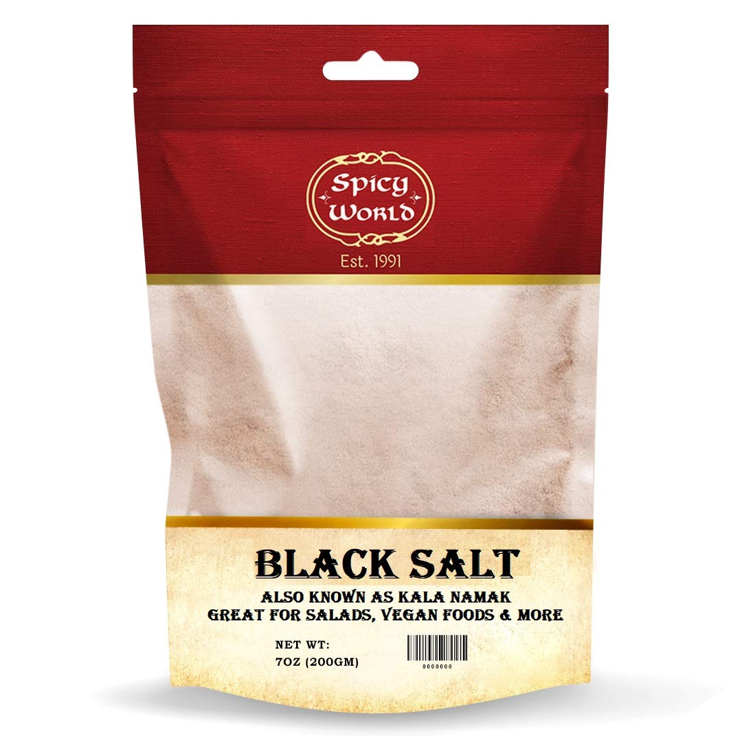 Spicy World Kala Namak powder bottle showcases vegan egg substitute for cooking.