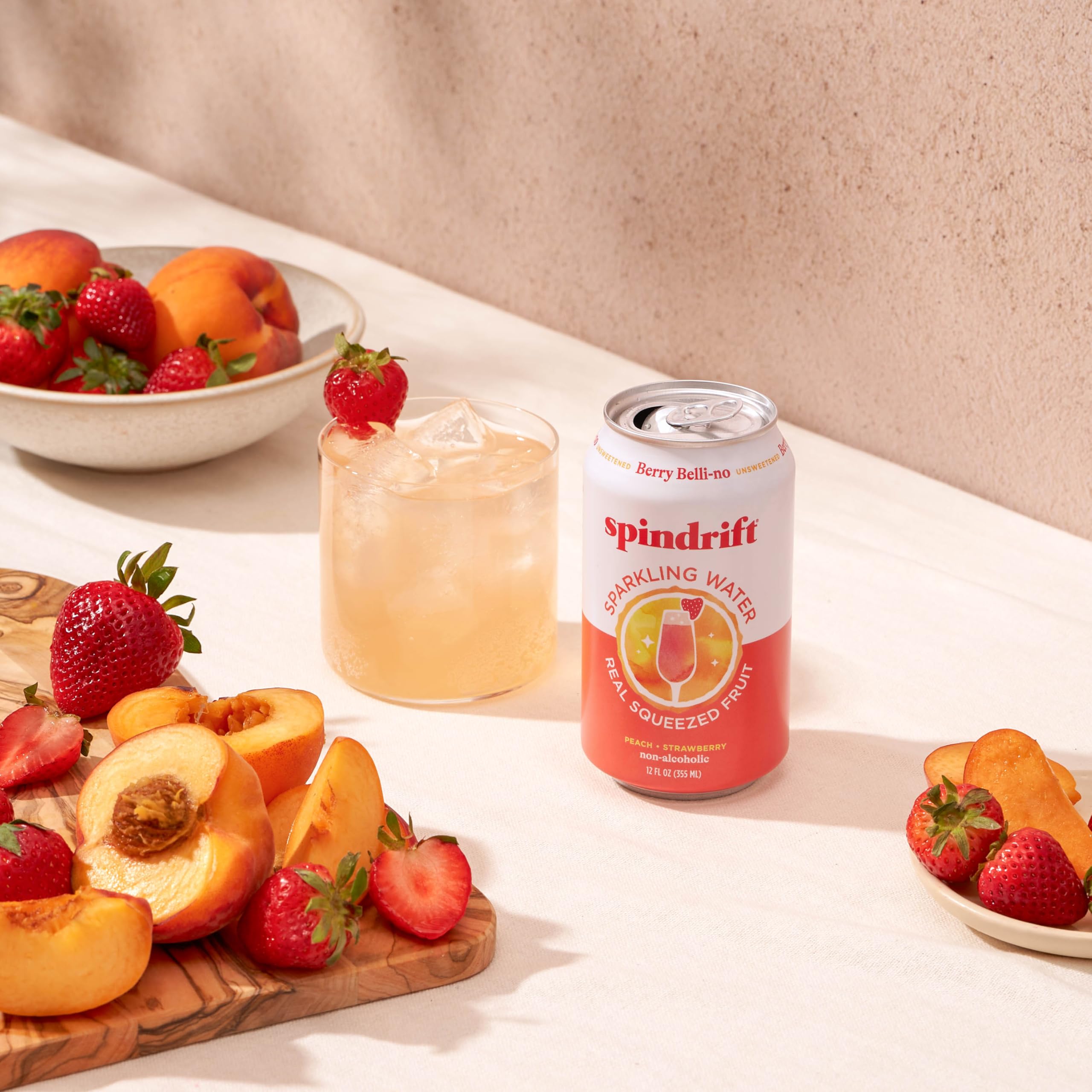 Berry Belli-no with vibrant berries suggests versatile flavor for mocktails or seltzer lovers.