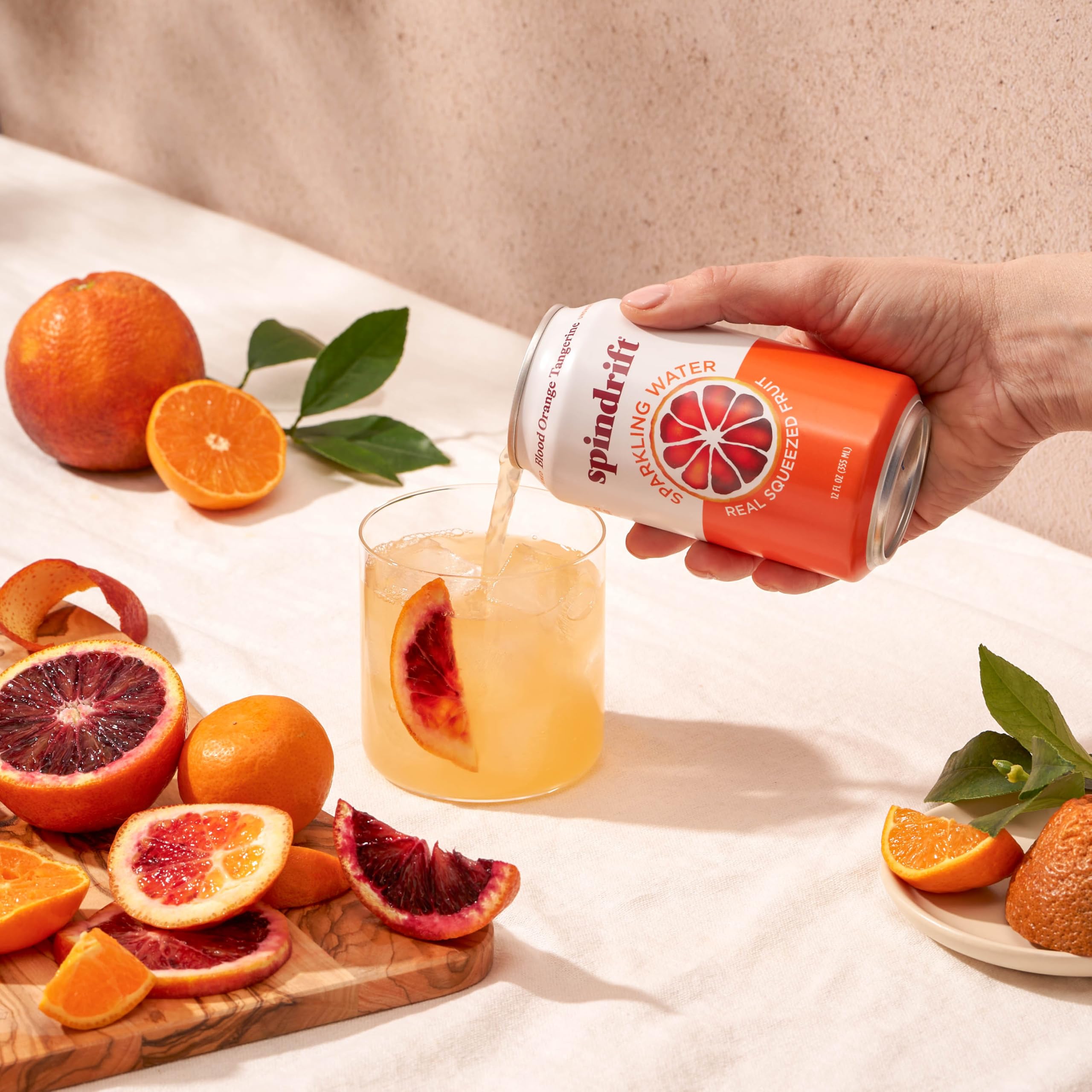 Spindrift blood-orange-tangerine pack-of-24 cans emphasizes convenient multi-pack.